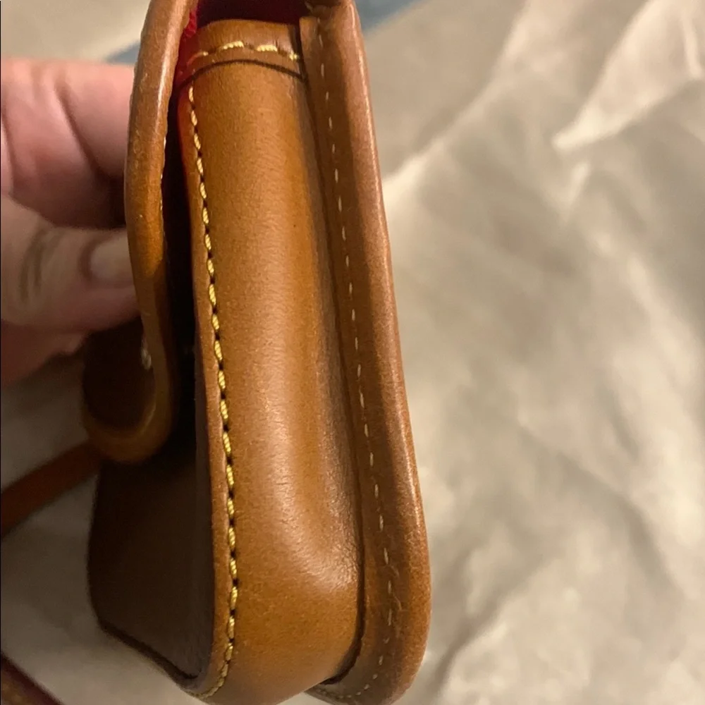 Dooney & Bourke Leather with Flap Closure and Wristlet NEVER USED LIKE NEW